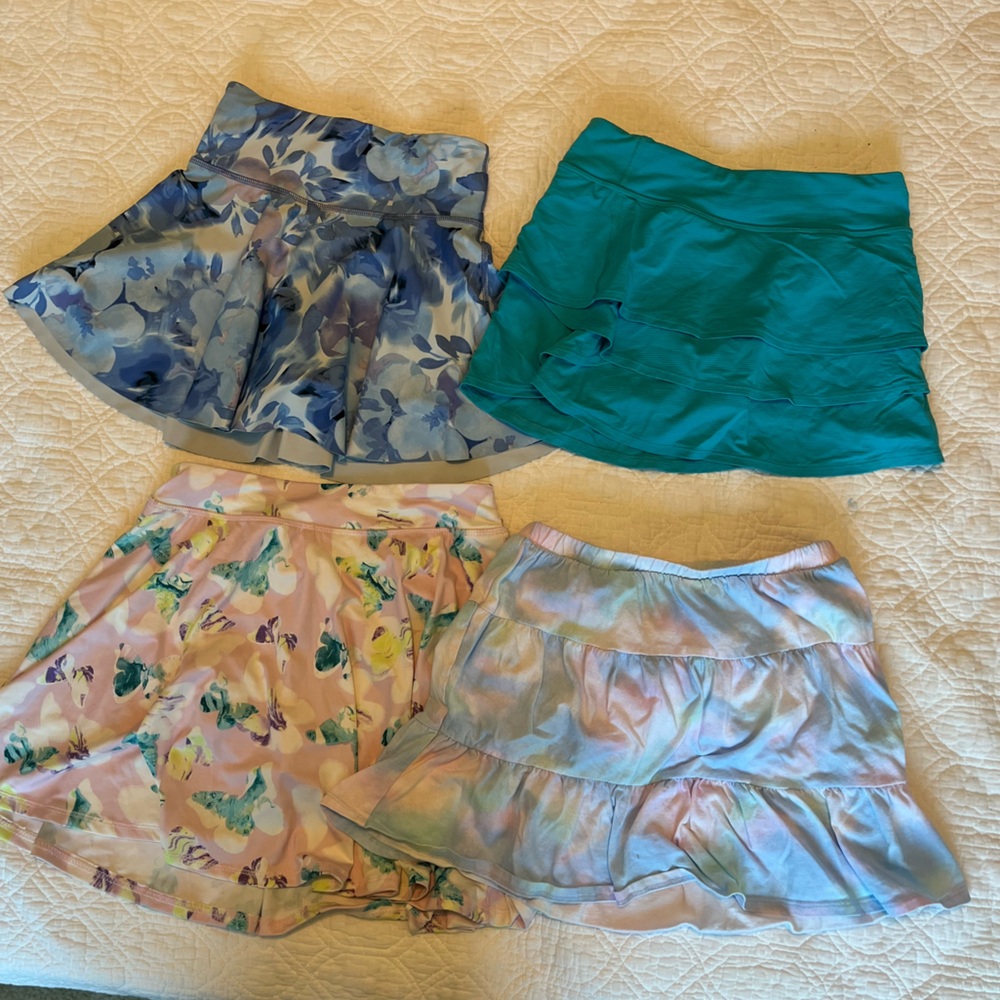 Four girls size M/8-10 spring skirts/squarts